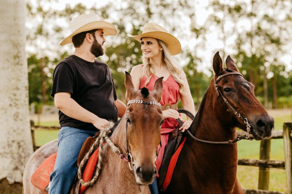 Couple on a horse riding date.